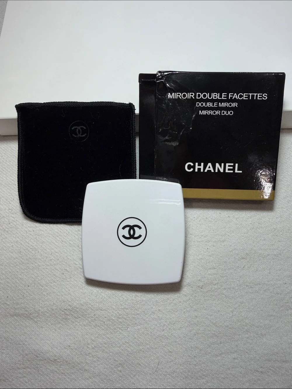 CHANEL White Compact Mirror with Black CC Logo
